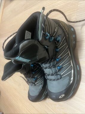 Gray and Black Salomon Women's Hiking Boots with Blue Accents